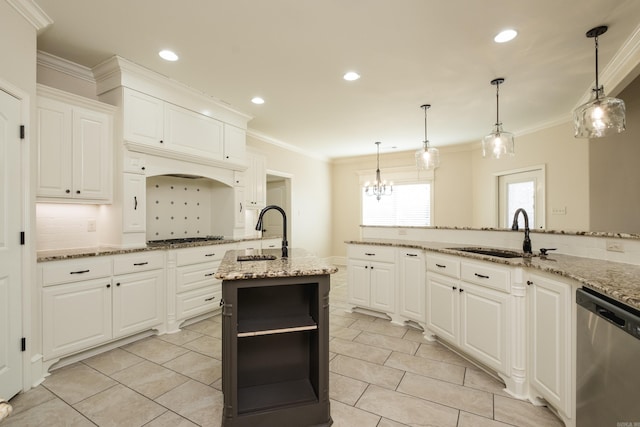 kitchen with tasteful backsplash, appliances with stainless steel finishes, crown molding, and a sink