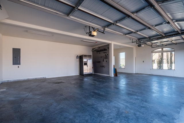 garage with electric panel and a garage door opener