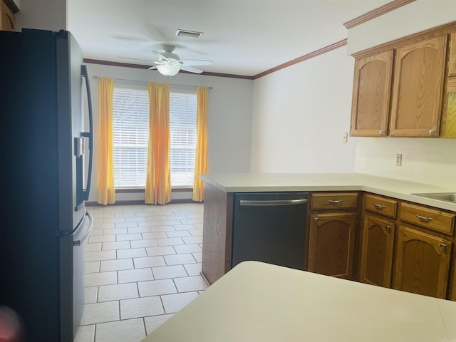 kitchen with dishwashing machine, a ceiling fan, visible vents, freestanding refrigerator, and ornamental molding