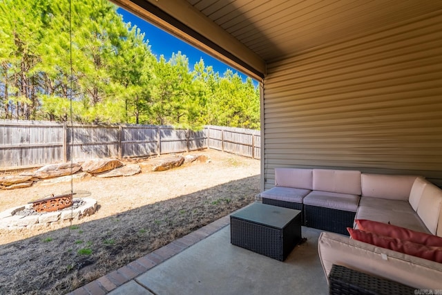 view of patio / terrace featuring an outdoor living space and a fenced backyard