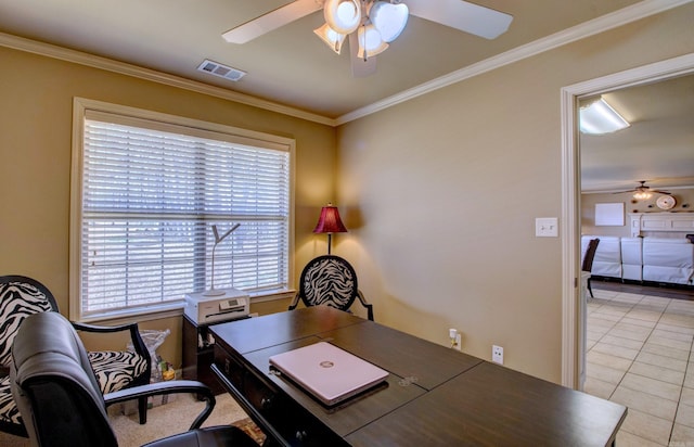 office space with light tile patterned floors, visible vents, ceiling fan, and ornamental molding