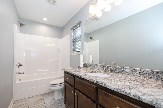 full bathroom featuring visible vents, toilet, bathtub / shower combination, and vanity