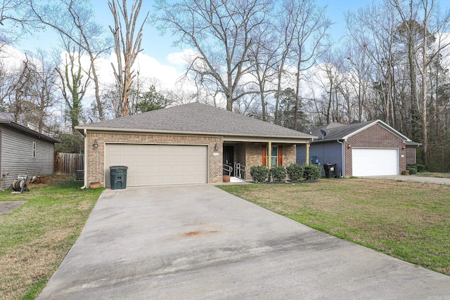 single story home featuring a front yard and brick siding