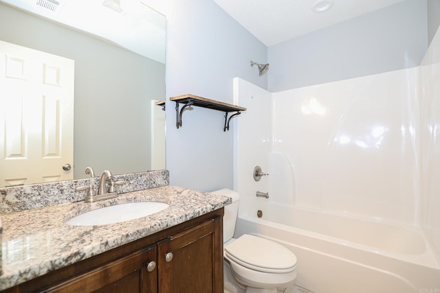 bathroom with visible vents, vanity, toilet, and washtub / shower combination