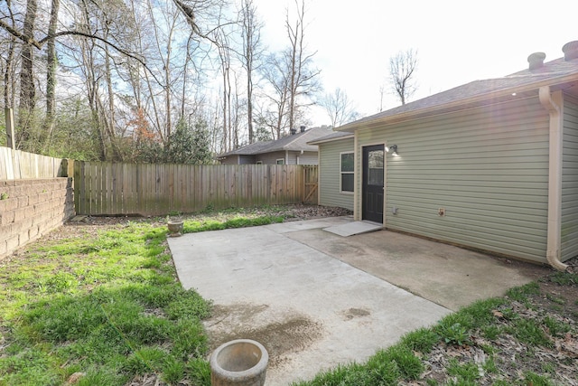 exterior space with a fenced backyard