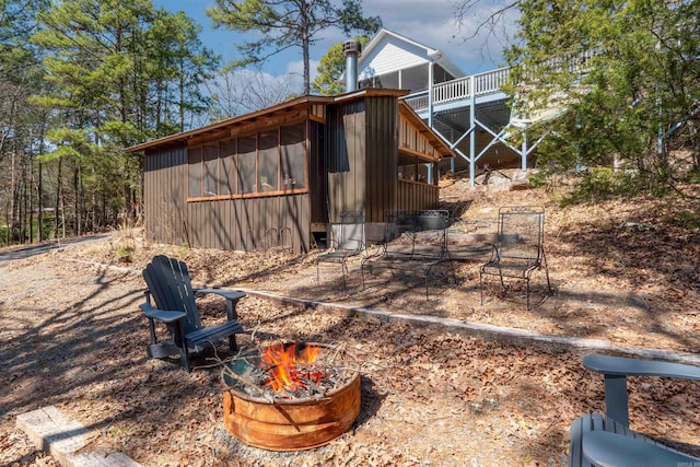 exterior space featuring a fire pit