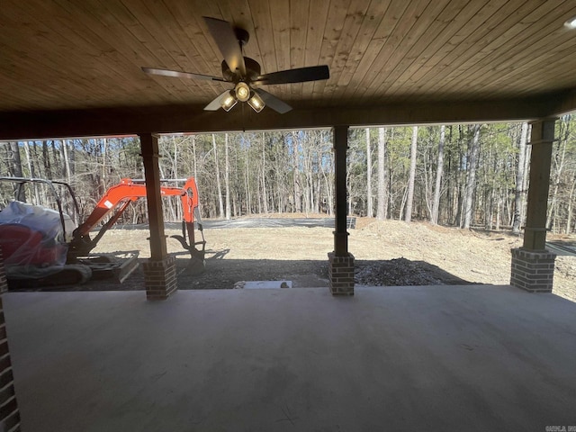 view of patio featuring ceiling fan