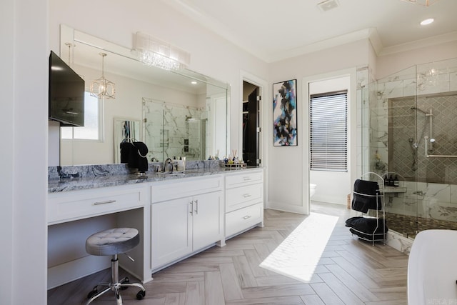 bathroom with vanity, visible vents, recessed lighting, a shower stall, and crown molding