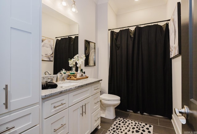 bathroom with vanity, toilet, a shower with curtain, and tile patterned flooring