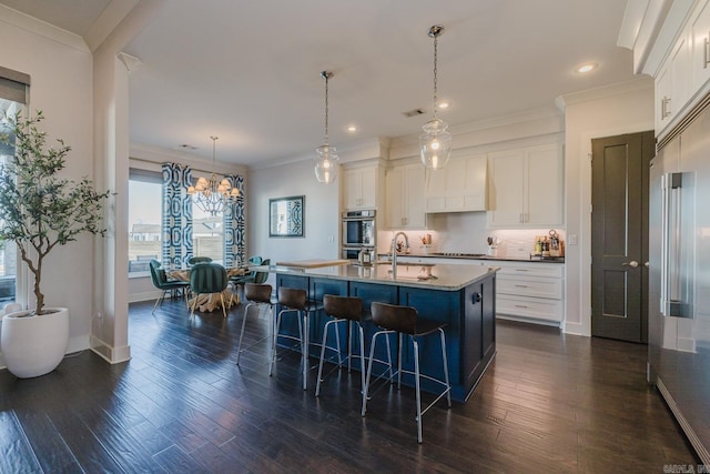 kitchen with backsplash, dark wood-type flooring, custom exhaust hood, and ornamental molding