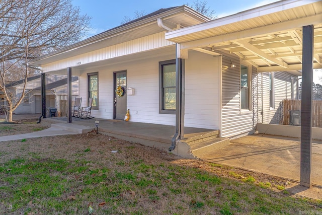 property entrance featuring covered porch