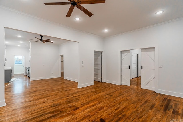 interior space featuring recessed lighting, wood-type flooring, crown molding, baseboards, and ceiling fan