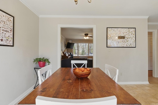 dining space with crown molding, light tile patterned floors, baseboards, and ceiling fan