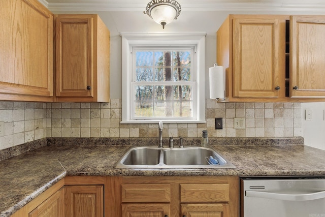 kitchen with tasteful backsplash, stainless steel dishwasher, dark countertops, and a sink