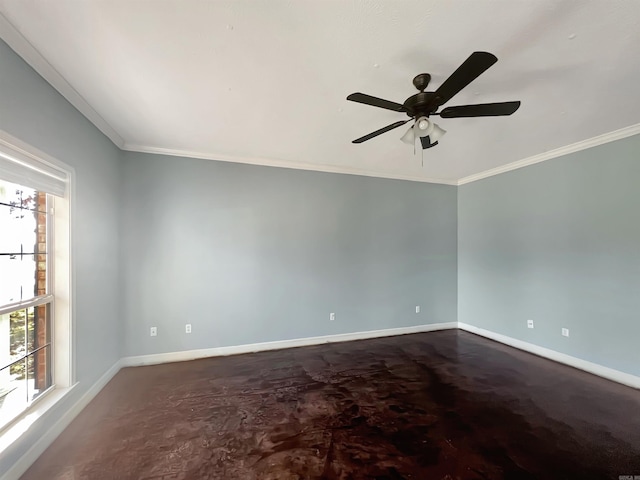 unfurnished room featuring baseboards, ornamental molding, and a ceiling fan