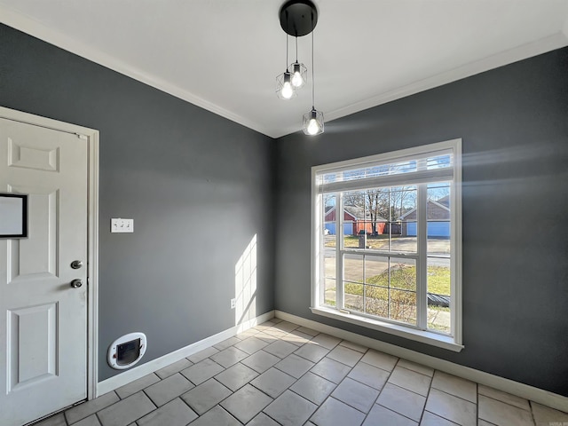 unfurnished dining area featuring tile patterned floors and baseboards