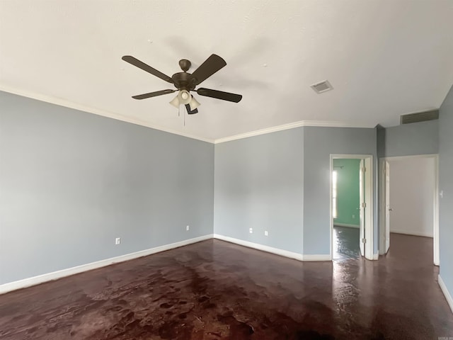 unfurnished room featuring visible vents, crown molding, baseboards, concrete flooring, and ceiling fan