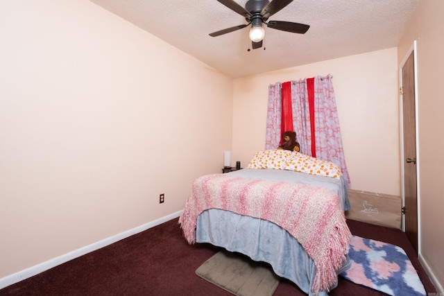 carpeted bedroom featuring ceiling fan, a textured ceiling, and baseboards