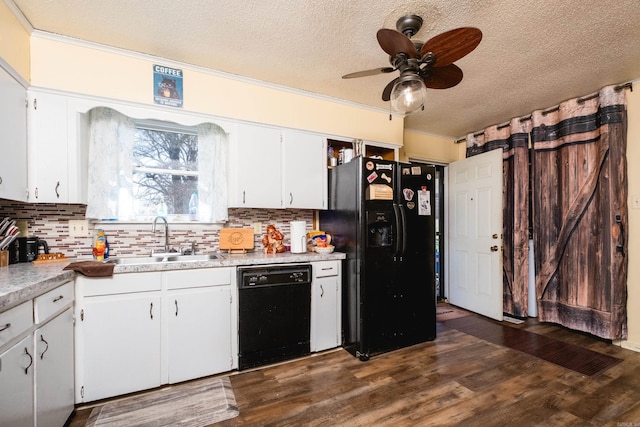 kitchen with a ceiling fan, dark wood finished floors, a sink, black appliances, and light countertops