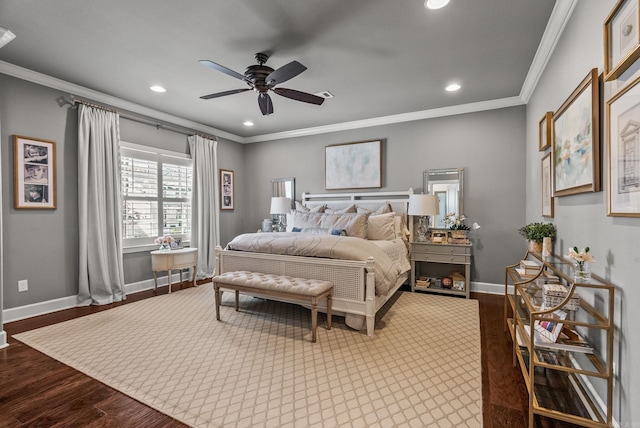 bedroom with dark wood-type flooring, baseboards, and ornamental molding