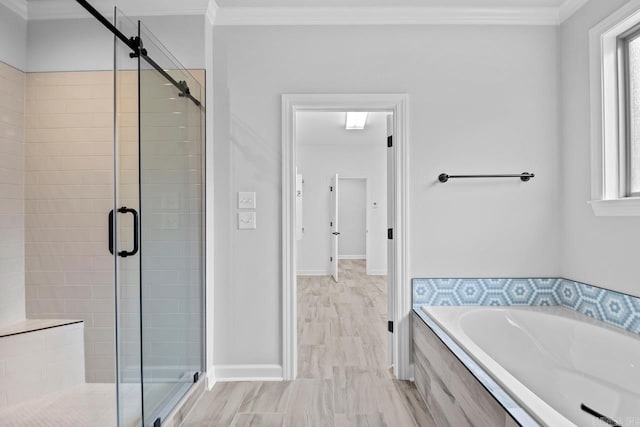 bathroom with a wealth of natural light, a stall shower, and crown molding