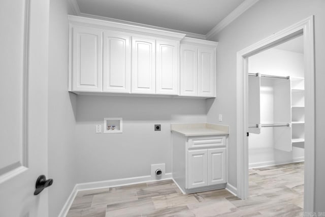 laundry room with washer hookup, ornamental molding, cabinet space, baseboards, and hookup for an electric dryer