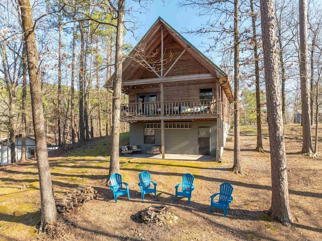 view of outdoor structure with an outdoor fire pit