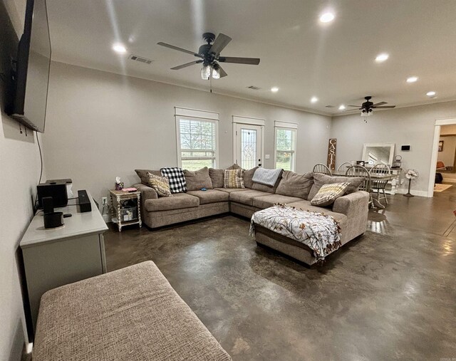 living room with visible vents, recessed lighting, a ceiling fan, and finished concrete floors