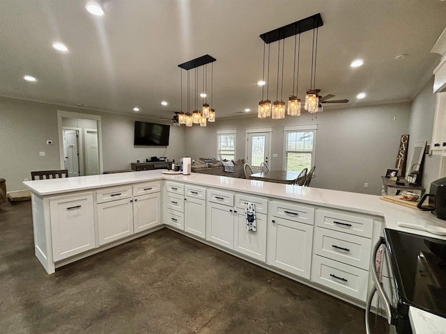 kitchen featuring open floor plan, recessed lighting, white cabinetry, and electric range oven