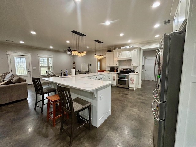 kitchen with visible vents, stainless steel appliances, open floor plan, and finished concrete flooring