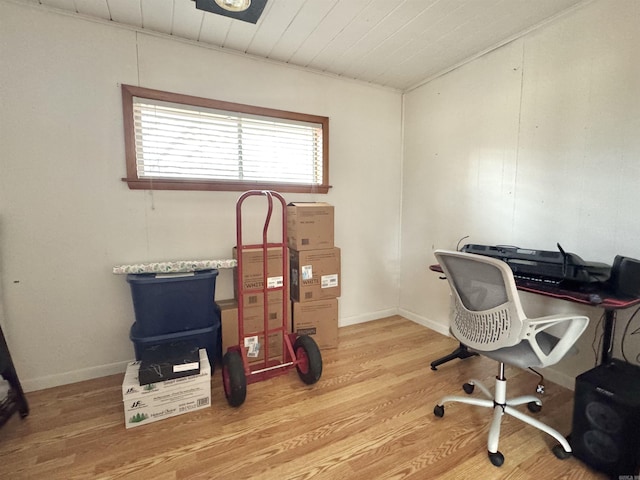 office space featuring wooden ceiling, baseboards, and light wood-style floors