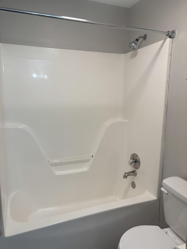 full bath with bathing tub / shower combination and toilet