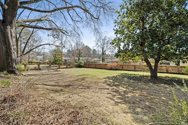 view of yard featuring fence