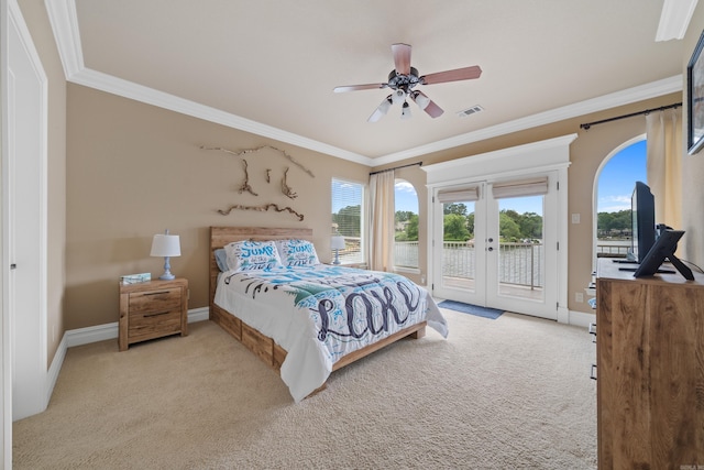 carpeted bedroom featuring ornamental molding, french doors, and access to outside