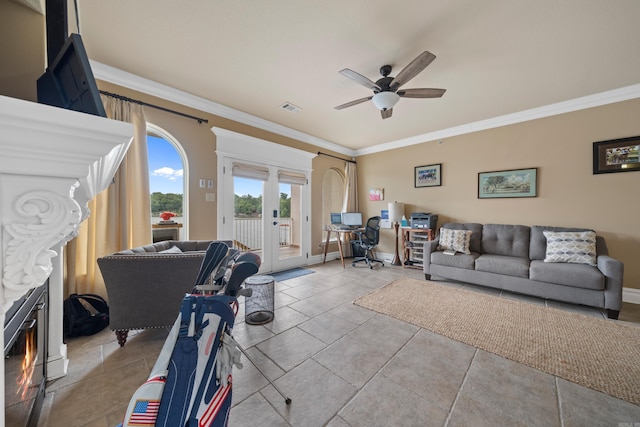 tiled living area featuring visible vents, french doors, ceiling fan, and ornamental molding