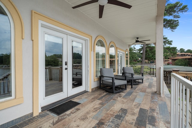 view of patio with french doors and ceiling fan