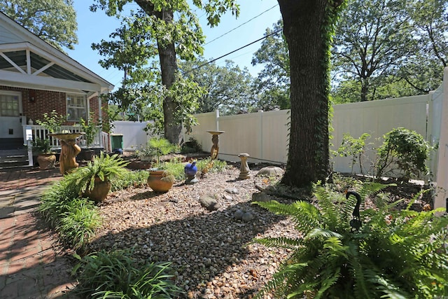 view of yard featuring a fenced backyard