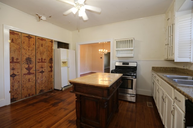 kitchen with a sink, dark wood finished floors, white fridge with ice dispenser, wooden counters, and stainless steel range with gas stovetop