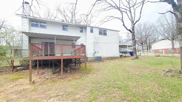 back of property featuring central AC unit, a yard, fence, and a wooden deck