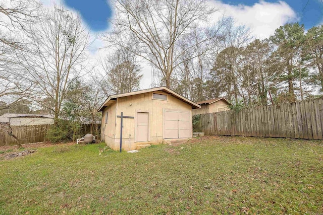 view of shed with a fenced backyard