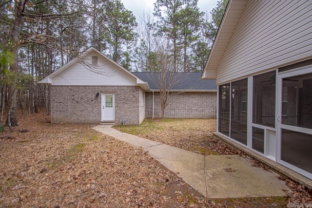 view of yard featuring a sunroom