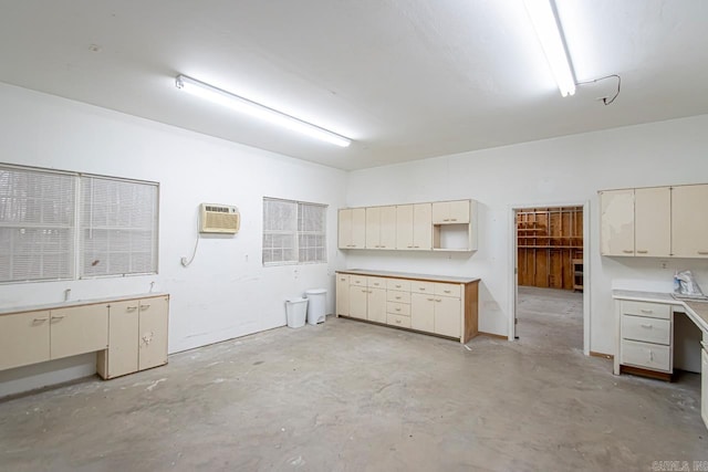 garage featuring an AC wall unit