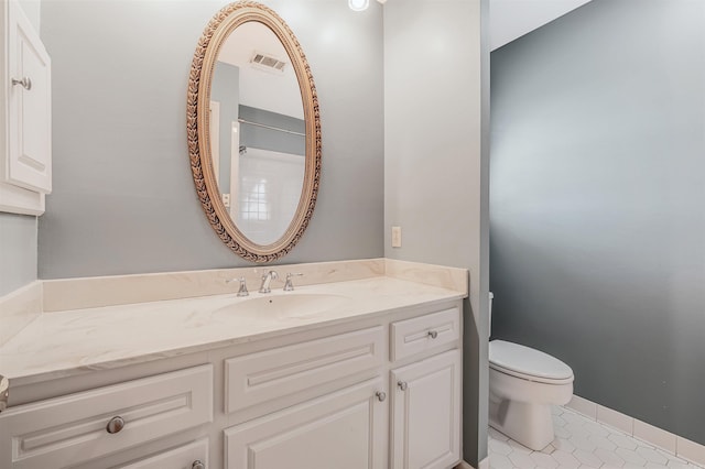 full bathroom with tile patterned floors, visible vents, toilet, baseboards, and vanity