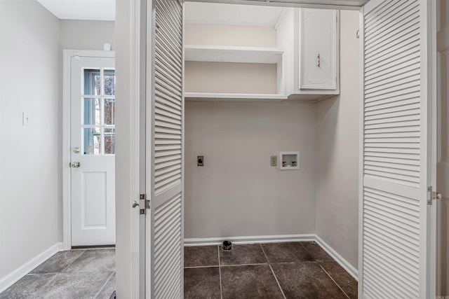 laundry area with hookup for a washing machine, cabinet space, baseboards, and hookup for an electric dryer