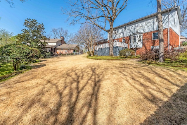 view of yard featuring fence