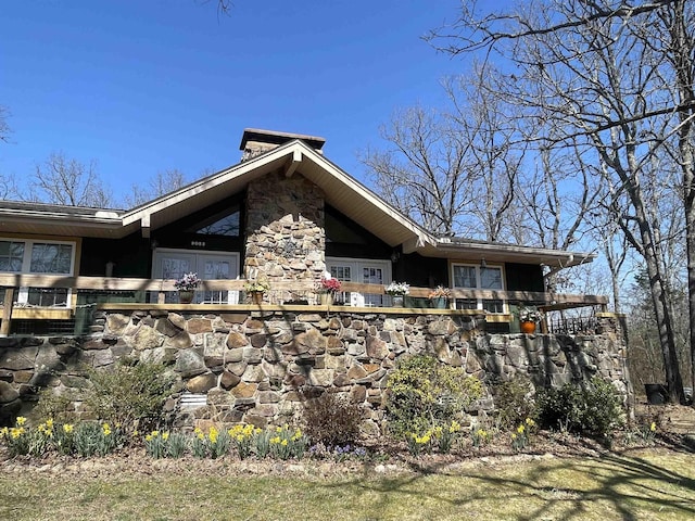 view of home's exterior with a chimney