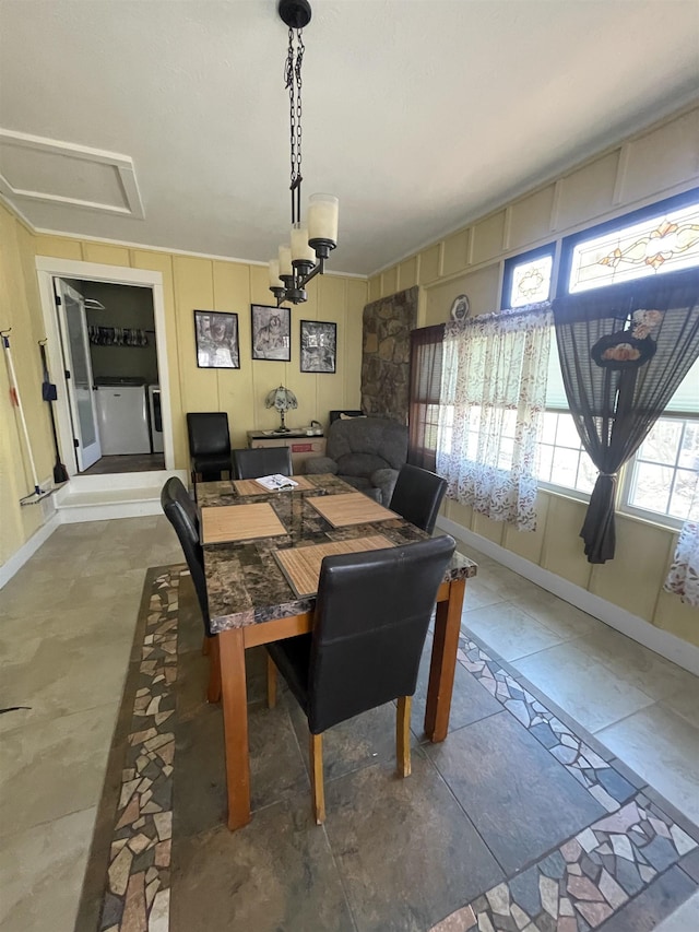 dining space featuring baseboards