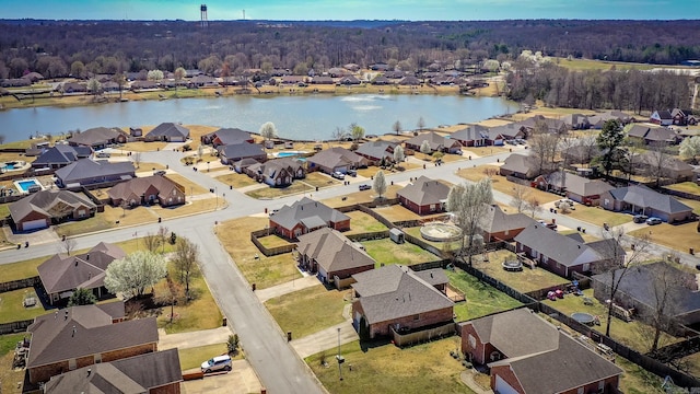 birds eye view of property featuring a residential view and a water view