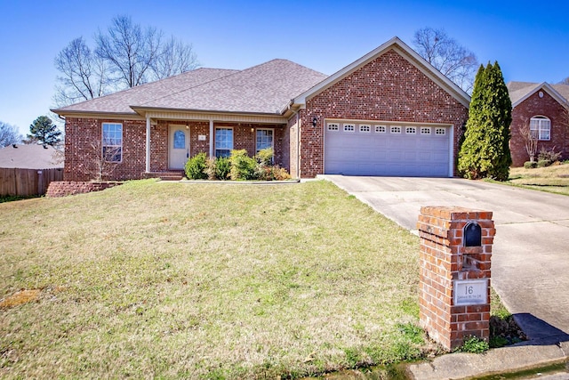 single story home with a front yard, an attached garage, brick siding, and driveway