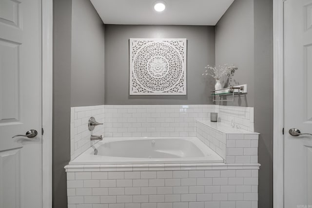 bathroom with a garden tub